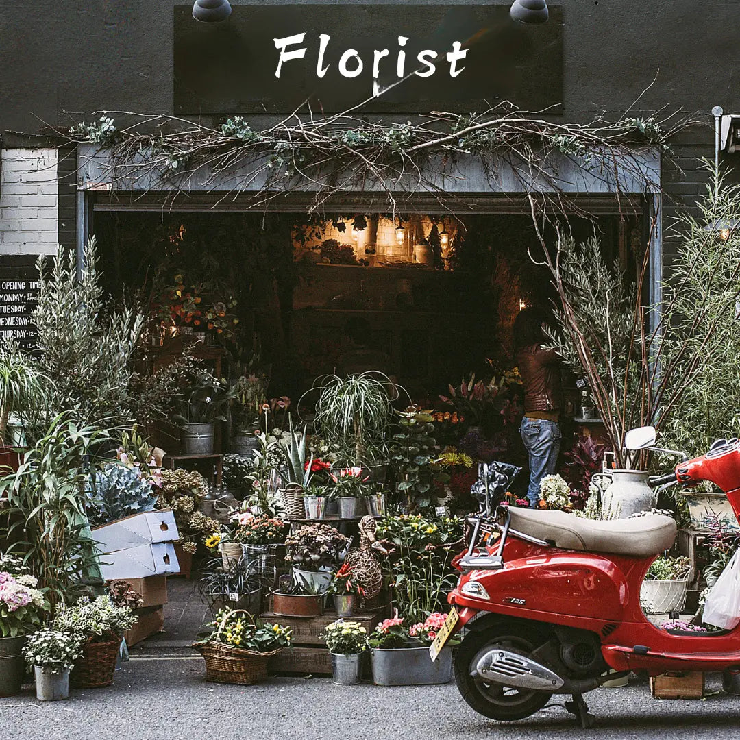 florist shop with buckets of flowers out the front