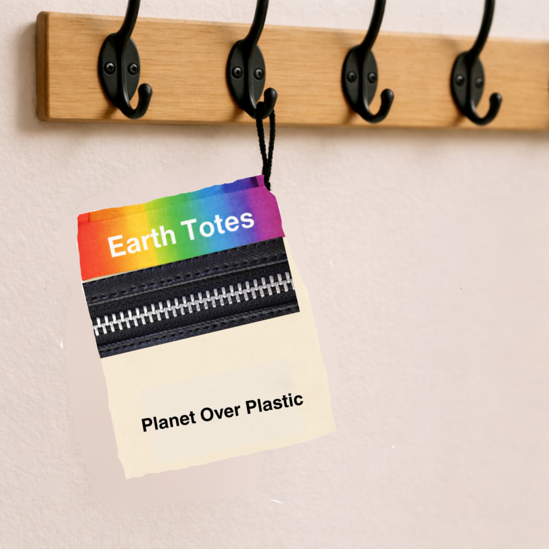 Earth Totes mesh net rainbow colour bag folded into zippered pocket and hanging on a hook
